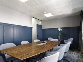 Blue and white office meeting area in a Mayfair office